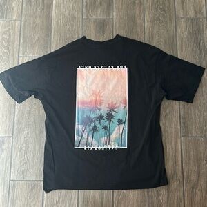 H&M Black Santa Cruz T-Shirt Size Large. Palm Tree Graphics on back.